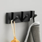 Foldbar Vægkrog i Rustfrit Stål – Minimalistisk Design til Pladsbesparende Opbevaring 13