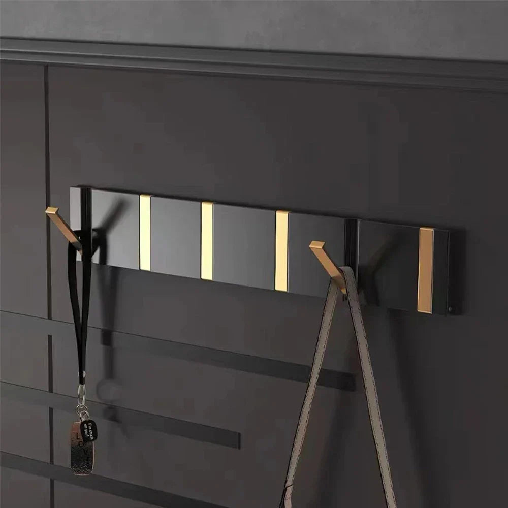 Foldbar Vægkrog i Rustfrit Stål – Minimalistisk Design til Pladsbesparende Opbevaring 2