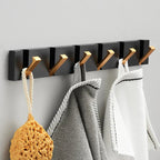 Foldbar Vægkrog i Rustfrit Stål – Minimalistisk Design til Pladsbesparende Opbevaring 9